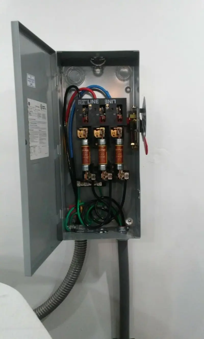 Three-phase disconnect switch installed for Smoke Detector Installation in Colby